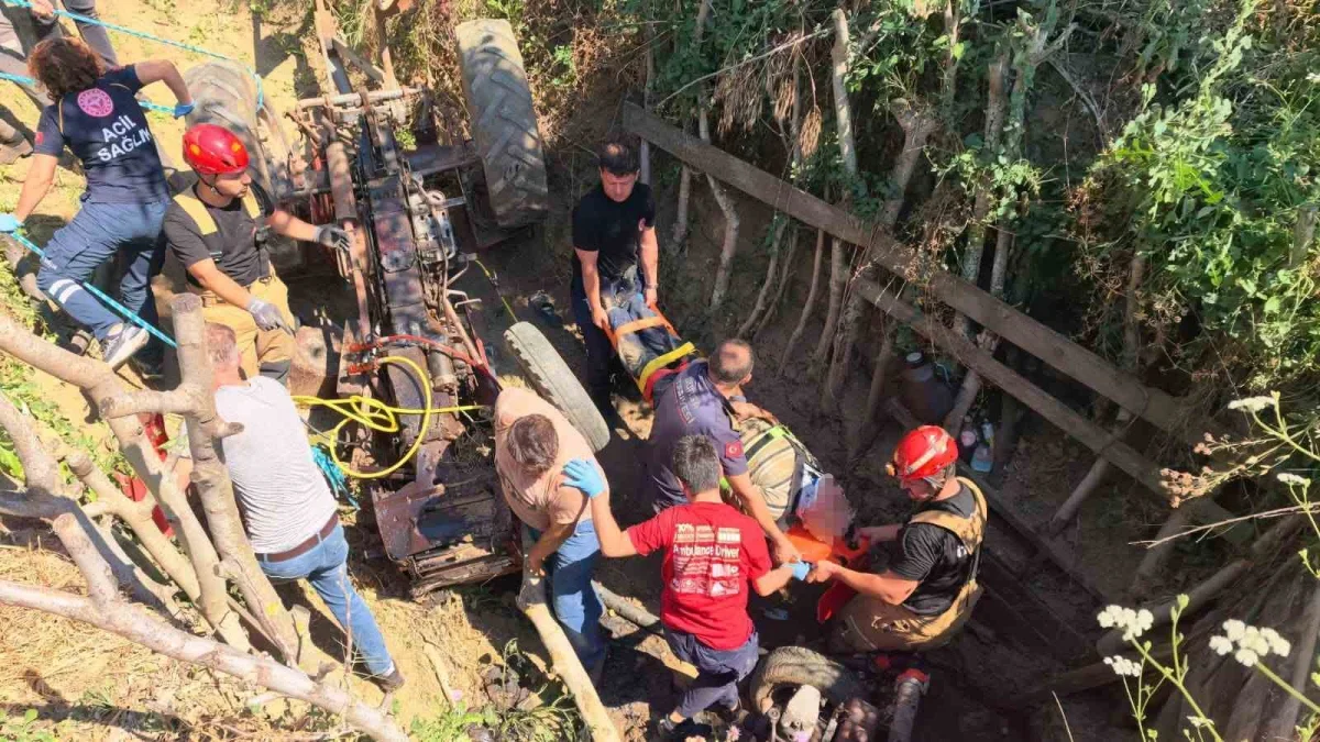 İnegöl'de traktör devrildi: Dede ağır yaralandı, 2 torunu kurtarıldı
