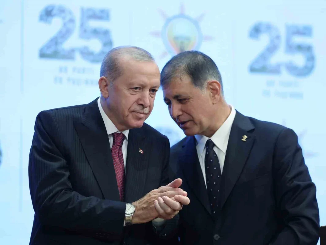Cemil Tugay AK Parti'ye katıldı, rozeti Erdoğan taktı